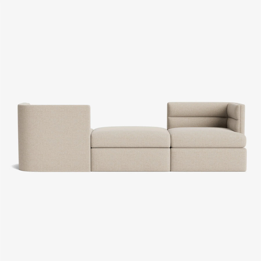 Modern minimalist modular fabric L-shaped sofa, suitable for shopping malls and hotels.